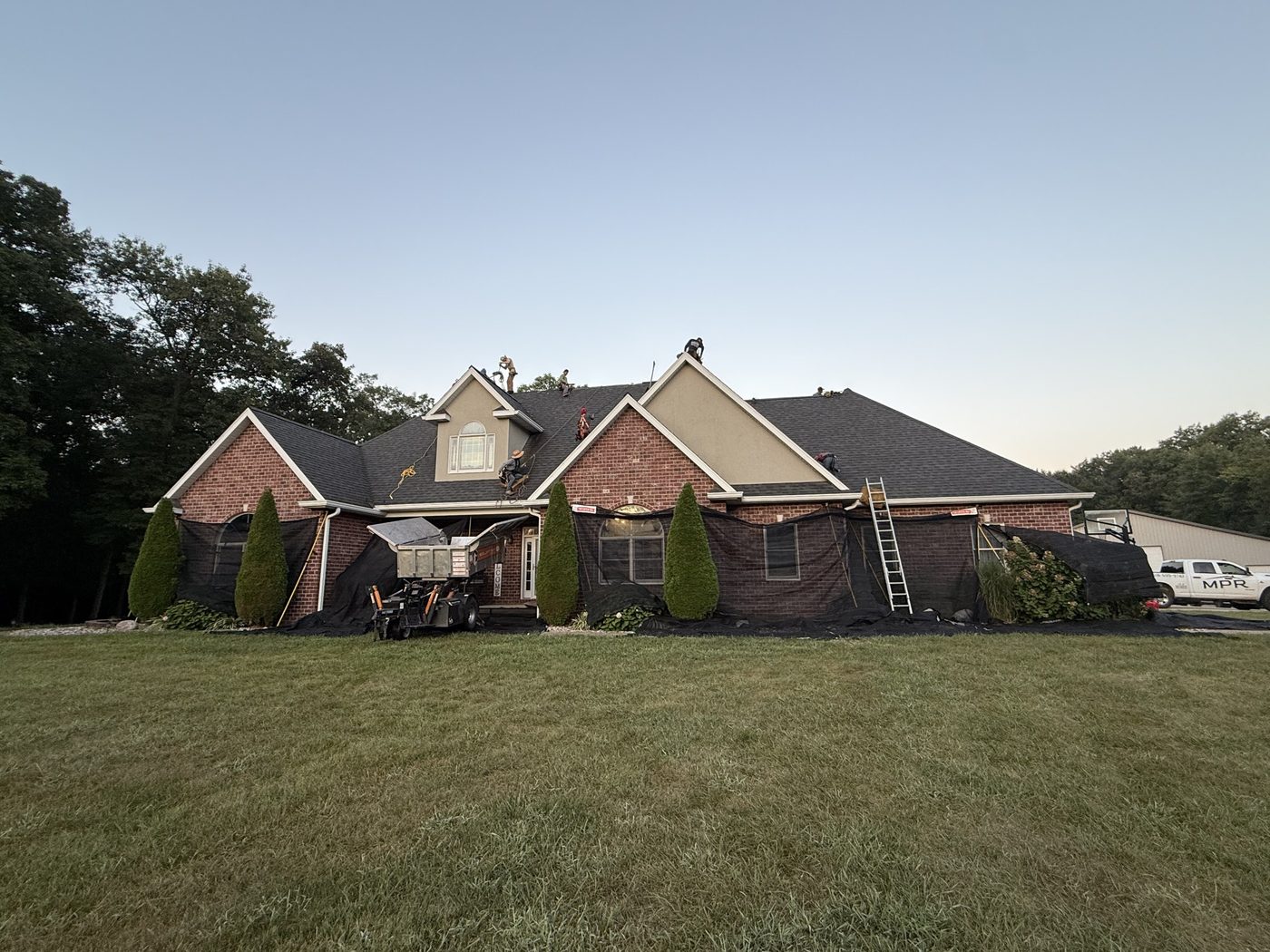 MPR Roofing installing new asphalt shingles on a brick home in Southern Illinois